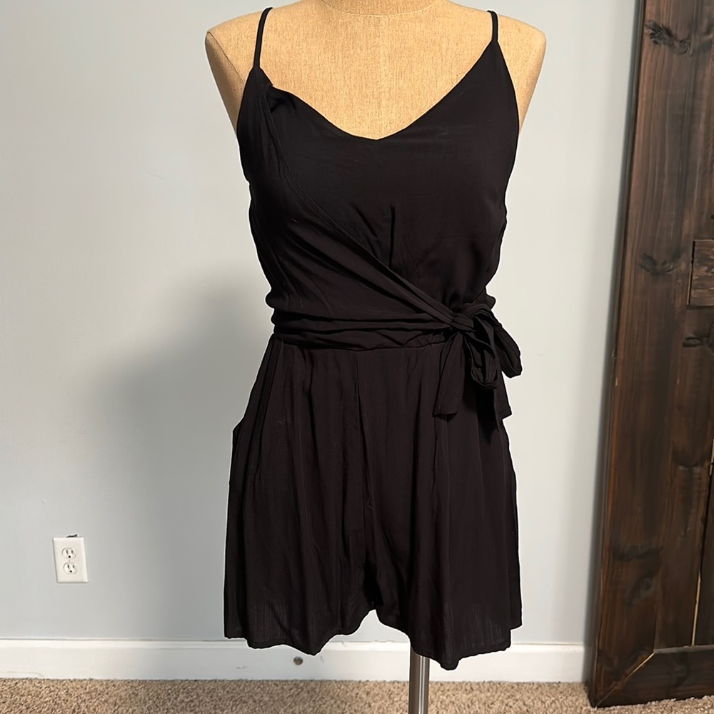 Black romper with pockets